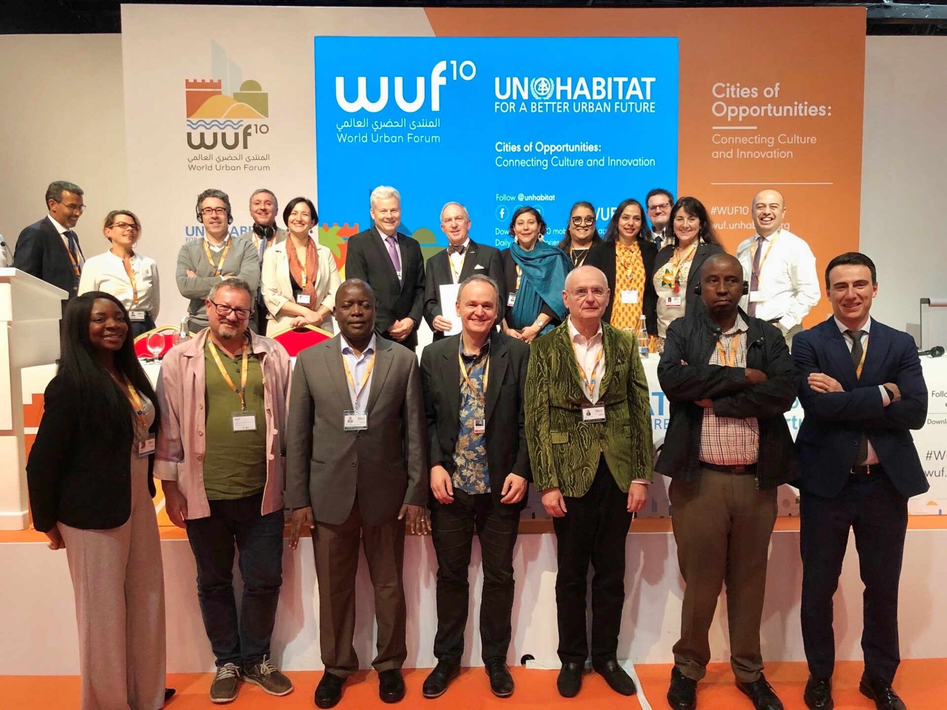Group photo of WUF10 participants