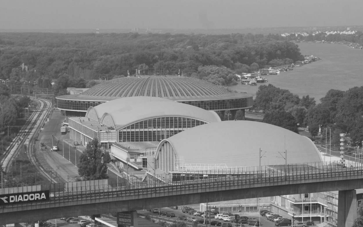 Picture in black and white of the Belgrade Fair complex from en elevated view
