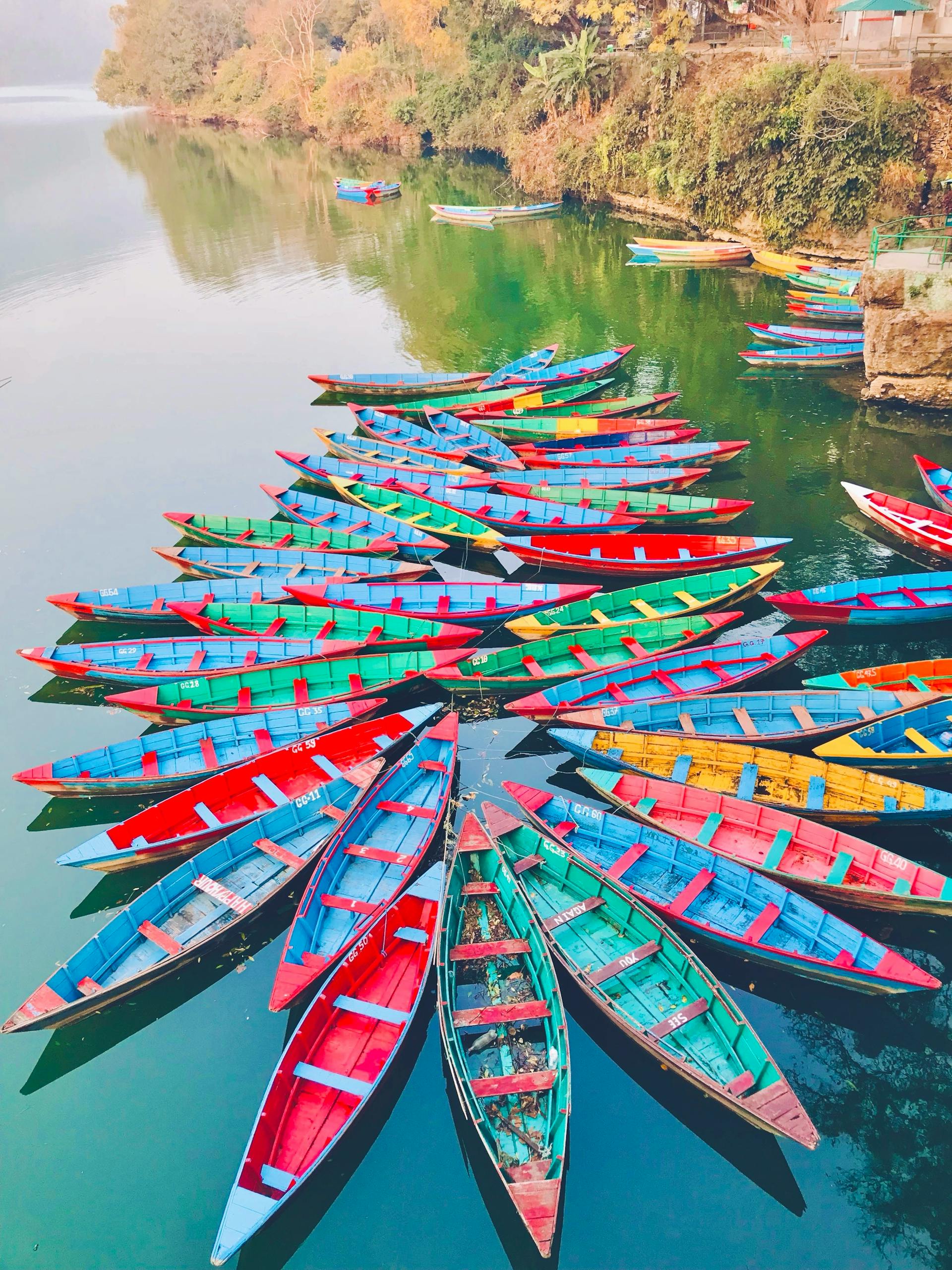 Photo of colorful boats on Pokhara lake, Nepal