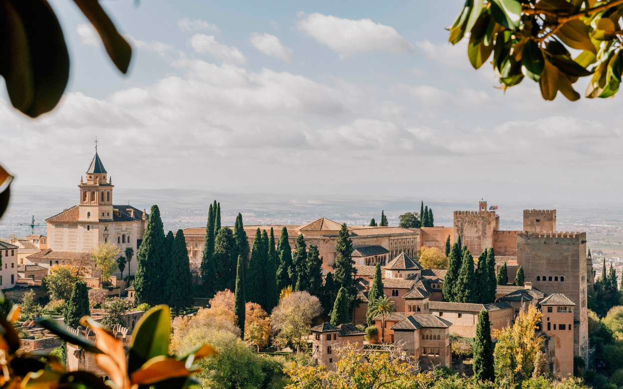 Picture taken from the city top, showing the Alhambra bathed in sunlight in Granada, Spain